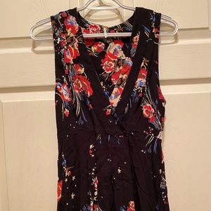 Free People size: XS black floral with stars mini dress or wear as a tunic